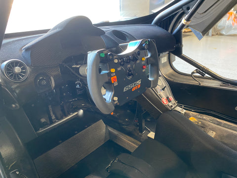 Interior Cockpit view of McLaren 650S GT3 For Sale at Prime Speed Sport in New Zealand. Chassis 019. Steering Wheel inspired by MP4-23A Formula 1 Car.