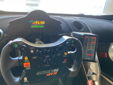 Steering Wheel and Dashboard of McLaren 650S GT3 For Sale at Prime Speed Sport in New Zealand. Chassis 019. Steering Wheel inspired by MP4-23A Formula 1 Car.