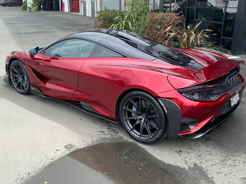 Rear 3/4 view of 2021 McLaren 765LT For Sale by Prime Speed Sport in New Zealand. Highly specced with full carbon pack and finished in MSO optioned Volcano Red exterior paint.
